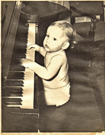 Eddie Zip Playing Piano In Diapers